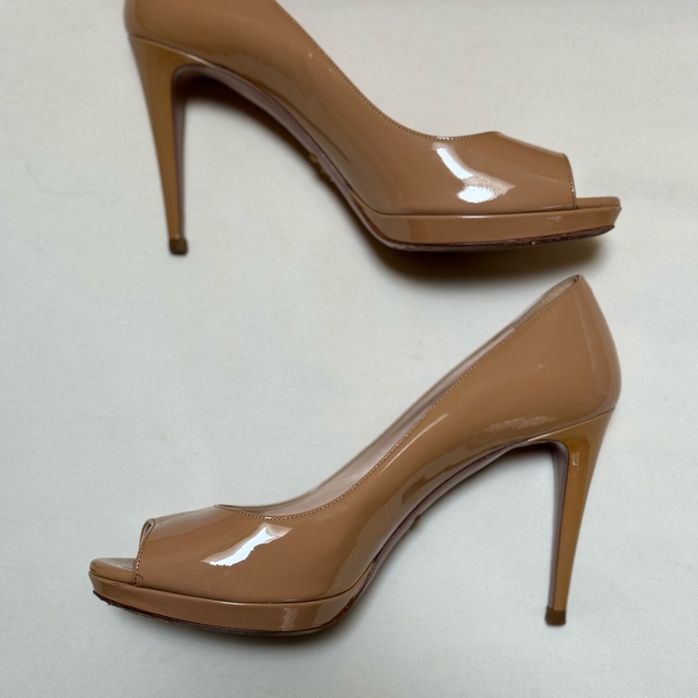 Prada platform heels in tan patent leather